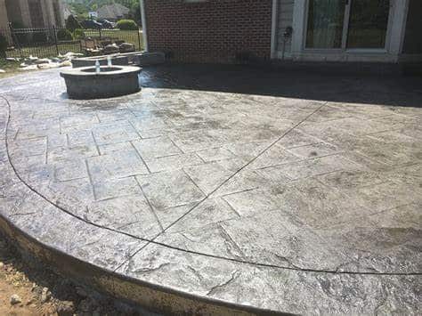 How To Use Concrete To Transform Your Old Backyard Into A Stamped Patio In Del Mar?